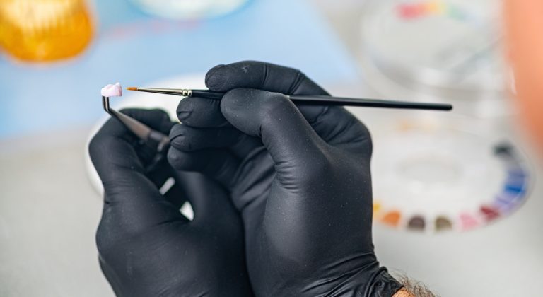 Prosthodontics. Dental Technician Making a Crown.